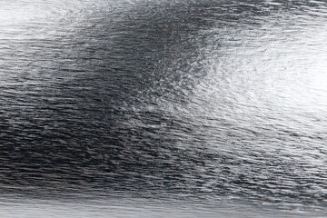 Abstract Metallic Texture with Light and Shadow Displaying Grain Effect