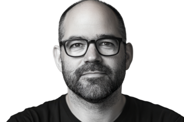 Close up portrait of a man with glasses and beard isolated on transparent background.