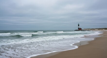 Fototapeta premium Coastal scene lighthouse sits on a breakwater, waves crash on beach under a cloudy sky