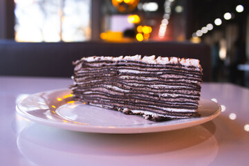 Decadent Chocolate Cake Slice with White Icing Drizzle