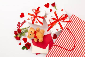 Valentine's Day composition with gifts and red roses on color background, top view