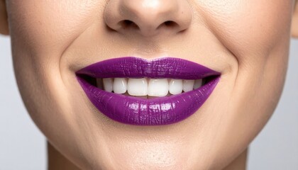Fototapeta premium Close Up of Woman’s Purple Smiling Lips