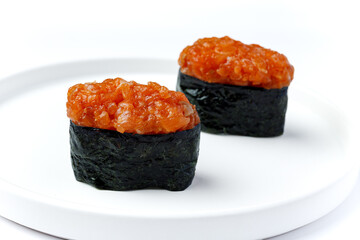 Nigiri with red fish on a white background isolated for menu