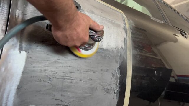 Auto Body Preparation with Air Sander Before Painting &ndash; 4K Stock Video