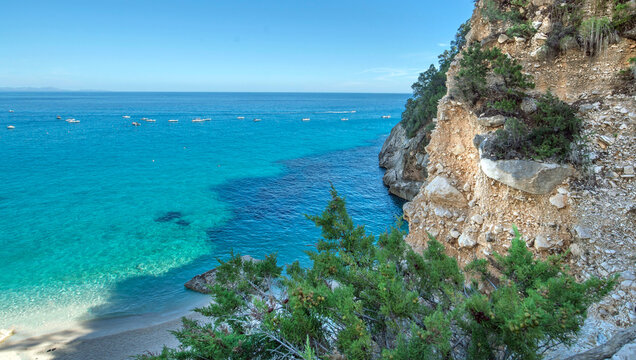 view in height on beautiful  beach of cala Goloritze in Sardinia-Italy, with turquoise and crystalline from hiking path
