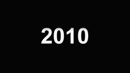 Stock photo of year two thousand ten white numbers on a black background