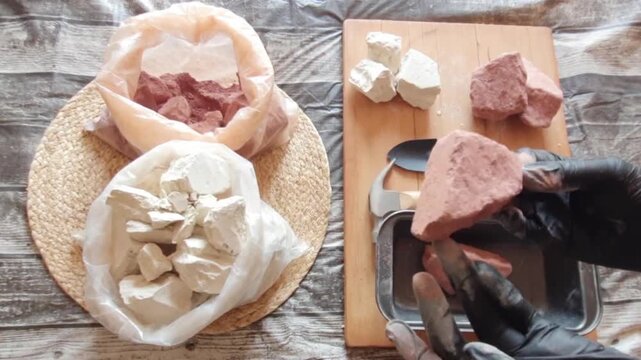 Purple clay stones on a wooden board
