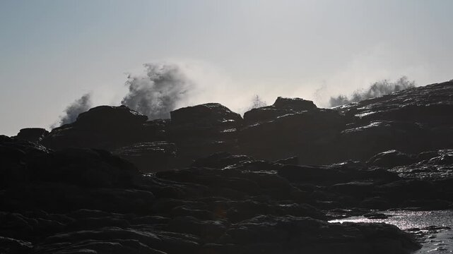 Stormy ocean waves. Big waves crashing on the rocks