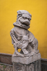 stone lion statue in chinese temple