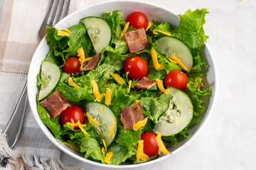 bacon salad  with cheese and tomatoes