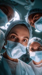 Medical team wearing masks looking down during surgery representing healthcare teamwork, emergency care, professionalism and clinical focus