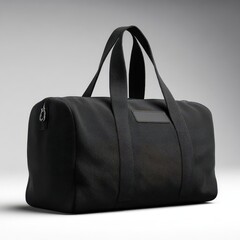 Naklejka premium Gym Bag Mockup. Black Cotton Textile Sport Fashion Bag with Handles Isolated on Empty Background