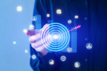 Interactive digital interface showcases user engaging with technological icons and data visuals in a futuristic setting