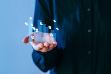 Man holding virtual bar graph with percentage symbols in a modern office setting