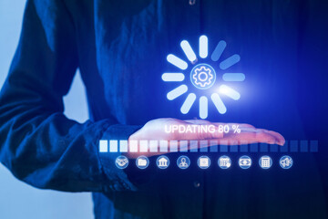 Hand displays updating progress at 80 percent with digital icons on blue background