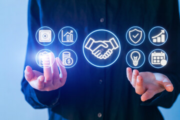 Collaborative business strategies represented through digital icons of finance, partnership, and innovation actions in a modern setting