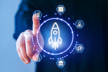 Digital interface with a hand interacting with rocket launch icons at a technology event