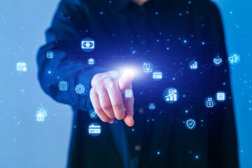 Business professional interacting with digital icons representing technology and finance in a modern office setting