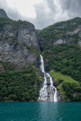Breathtaking view of the Friaren waterfall in the Geirangerfjord. Norway