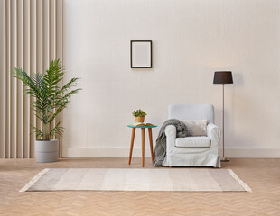 Cozy and bright living room interior design featuring a comfortable armchair, purple lamp, simple side table with a plant, and a large potted tree against a textured white wall.