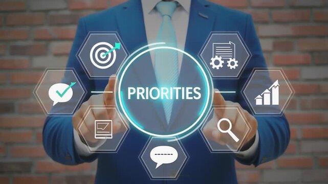 Concept of establishing and organizing priorities in business. Business person using virtual touch screen presses the word PRIORITIES. 4k video