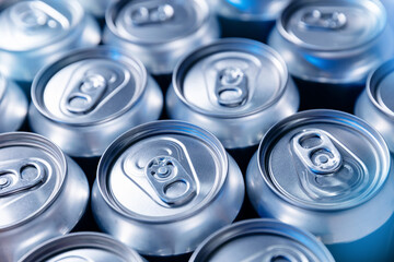 High tech beer factory, rows of aluminum cans ready for distribution and consumption, blue light