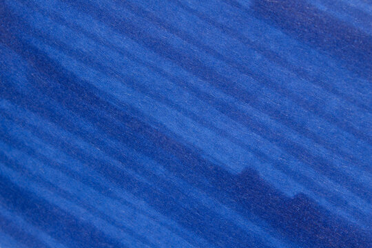 Blue marker texture on paper, hand painted background with visible pen strokes and soft shading