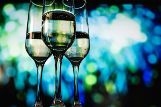 Summer seaside celebration with sparkling drinks, Festive summer event featuring champagne and ocean