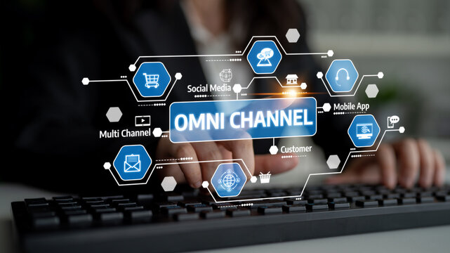 A business professional engaged in keyboard work, surrounded by a graphical display showcasing omni-channel marketing strategies and digital interactions. Tessel