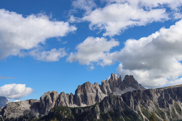 Clouds over the rocky peaks of Dolomites