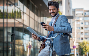 Good news. Happy smiling businessman checking mail from his client on smartphone. Business, lifestyle concept