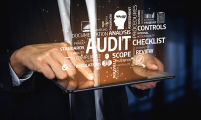 A businessman interacts with a tablet, analyzing audit data while visual elements demonstrate...