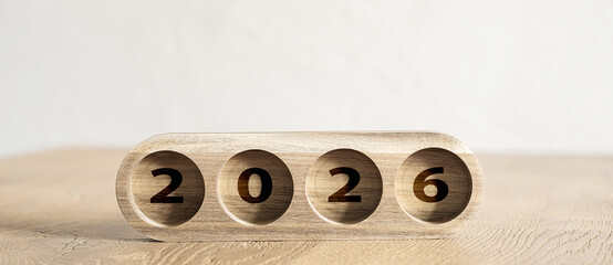 Wooden number blocks 2026 symbolizing new business year and financial goals