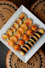 Sushi set on a white plate isolated