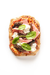 Gourmet flatbread with mortadella, fresh spinach leaves, creamy ricotta cheese, and morel mushrooms, shot from above on a clean white background