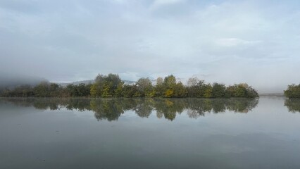 reflection of trees in the lake