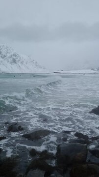  Skagsanden Beach in the Lofoten Islands, Norway in the winter on a cloudy day.
