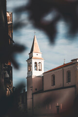 bell tower of the church in porec, croatia