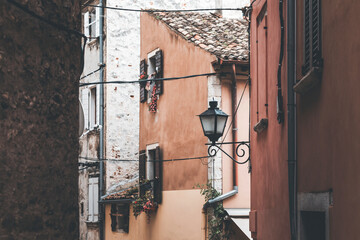 view of the windows and walls with lamps in rovinj old town
