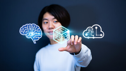 Young man interacting with futuristic digital interface with icons