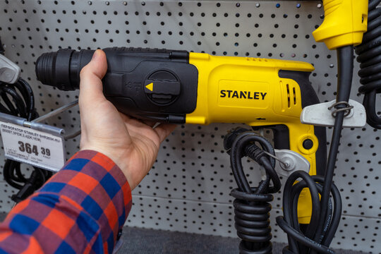 A Stanley brand electric drills are sold in the power tool store. Showcase with power tool drills. Stanley is founded in 1843 in Connecticut by Frederik Stanley. Minsk, Belarus - june 26, 2025