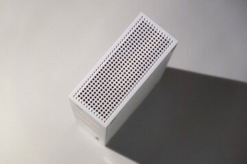 A futuristic device with holes
