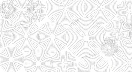 Gray and white illustration of multiple circular designs with concentric lines on a solid white background.