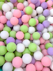 Fresh cherries in a bowl on a swing in a summer garden