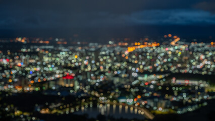 Abstract blurred bokeh background of city at night Bangkok Thailand