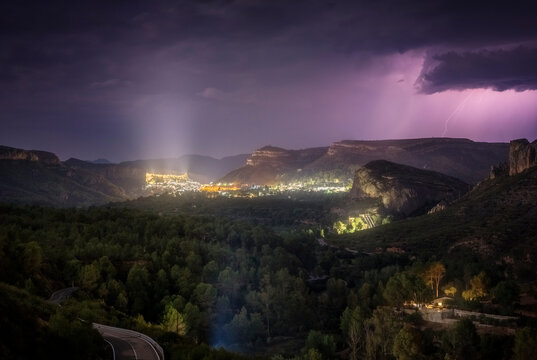 Lightning Storm Over a Mountain Village at Night - Majestic Night Storm Lighting Up a Remote Village