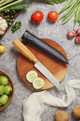 photo of a kitchen knife specifically for cutting vegetables and fruit, mirror and satin knife material