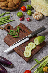 photo of a kitchen knife specifically for cutting vegetables and fruit, mirror and satin knife material