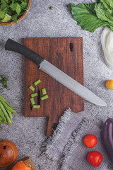 photo of a kitchen knife specifically for cutting vegetables and fruit, mirror and satin knife material