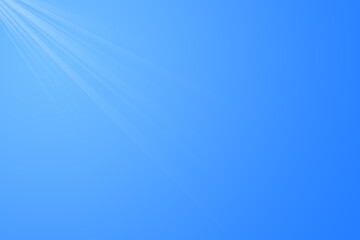 Sun in blue sky. Bright warm sun and lens flare in clear summer sky, sunlight with sunshine glare rays.
